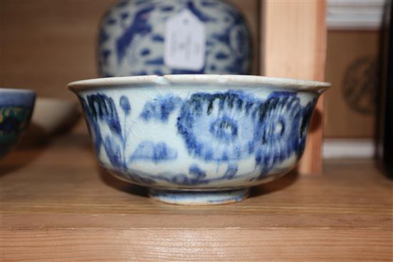 A Chinese blue and white vase and four bowls height 21cm